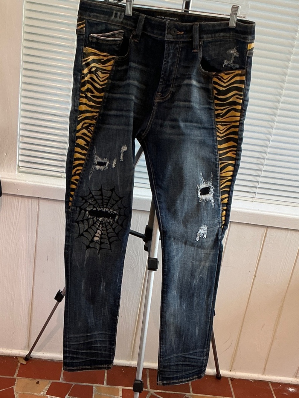 Men's Blue Distressed Jeans with Yellow Tiger Panels